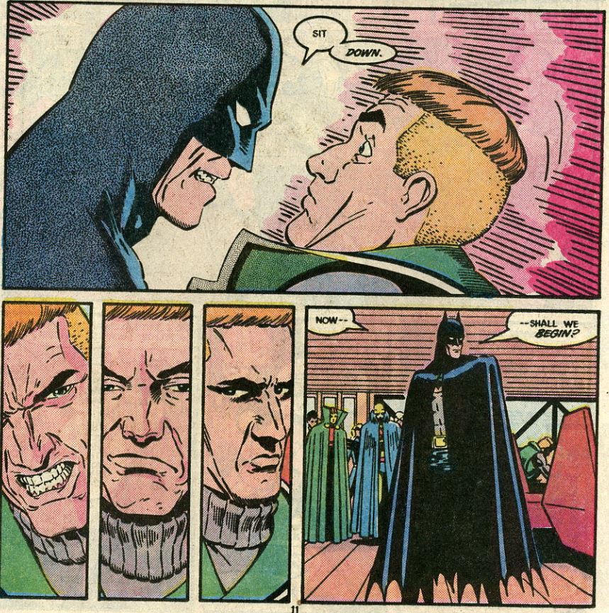 Batman telling Guy Gardner to sit down, the latter showing a range of emotions in response before sitting down